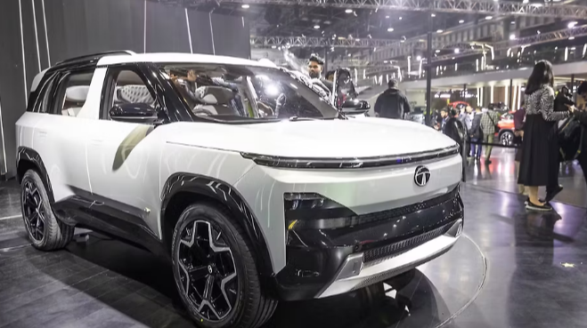 Tata Sierra EV 2025 dual motor AWD with 65kWh/75kWh battery and 500–600 km range
Tata Sierra EV 2025 fast charging port showing 10–80% charge in 30 minutes
PRICE & DESIGN
Tata Sierra EV 2025 electric SUV India starting price ₹20 Lakh with iconic retro-modern design theevsupermarket.com