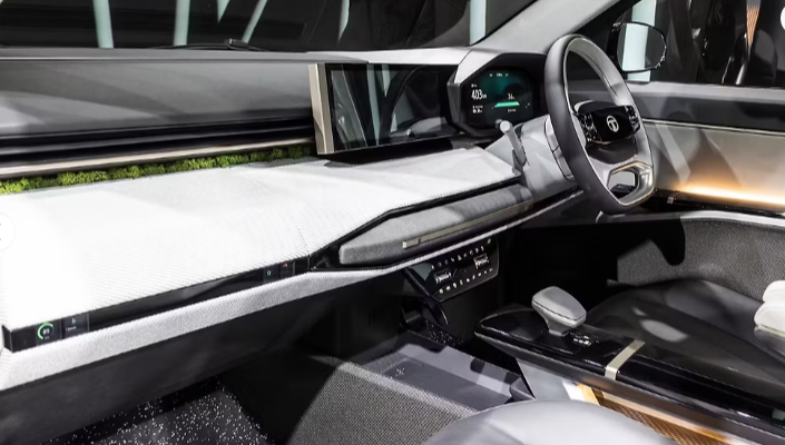 Tata Sierra EV 2025 panoramic glass roof with modern safety compliance and bright cabin feel,tata serra ev full review.