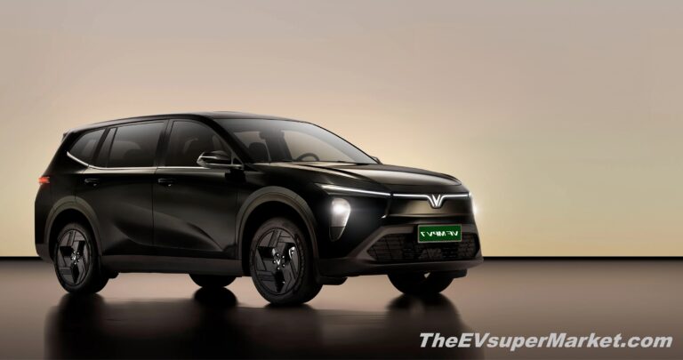 VinFast VF 7 right front three quarter view showing LED headlights and aerodynamic electric SUV design